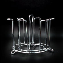 Round Glass Stand Used For Holding Sensitive Glasses And All Present In All Kinds Of Kitchens Of Official And Household Places Etc.