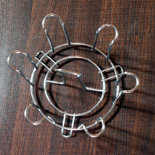 Round Glass Stand Used For Holding Sensitive Glasses And All Present In All Kinds Of Kitchens Of Official And Household Places Etc.