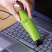 Convenient mini vacuum cleaner for cleaning hard-to-reach areas in cars and computers.