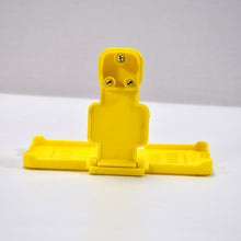 Multi-purpose Wall Holder Stand For Charging Mobile Just Fit In Socket And Hang (Yellow)