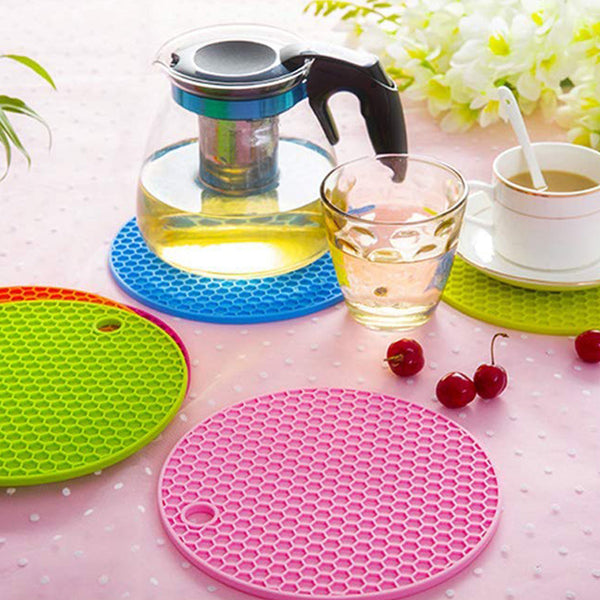 4 Pc Silicon Hot Mat For Placing Hot Vessels And Utensils Over It Easily Without Having Any Visible Marks On Surfaces.